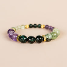 Lade das Bild in den Galerie-Viewer, MUJA JUMA Armband Spread your wings, Smaragd, in Gold
